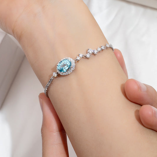 Ecob-630 | Celeste Halo Lab Sapphire Bracelet in 18K Gold