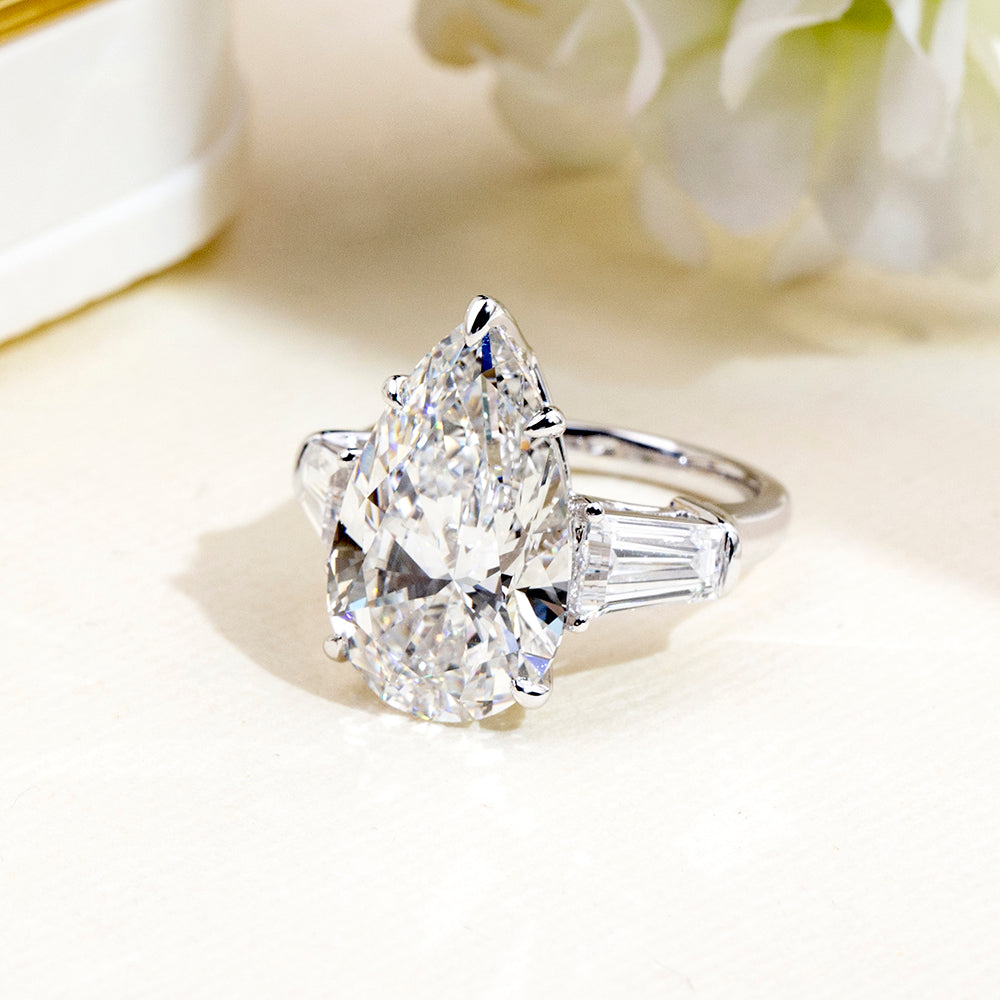 Eco-1888: Crowned Light – Lab-Grown Pear Diamond Three-Stone Ring in 18K White Gold