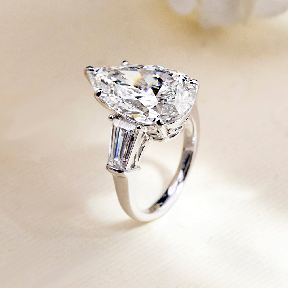 Eco-1888: Crowned Light – Lab-Grown Pear Diamond Three-Stone Ring in 18K White Gold