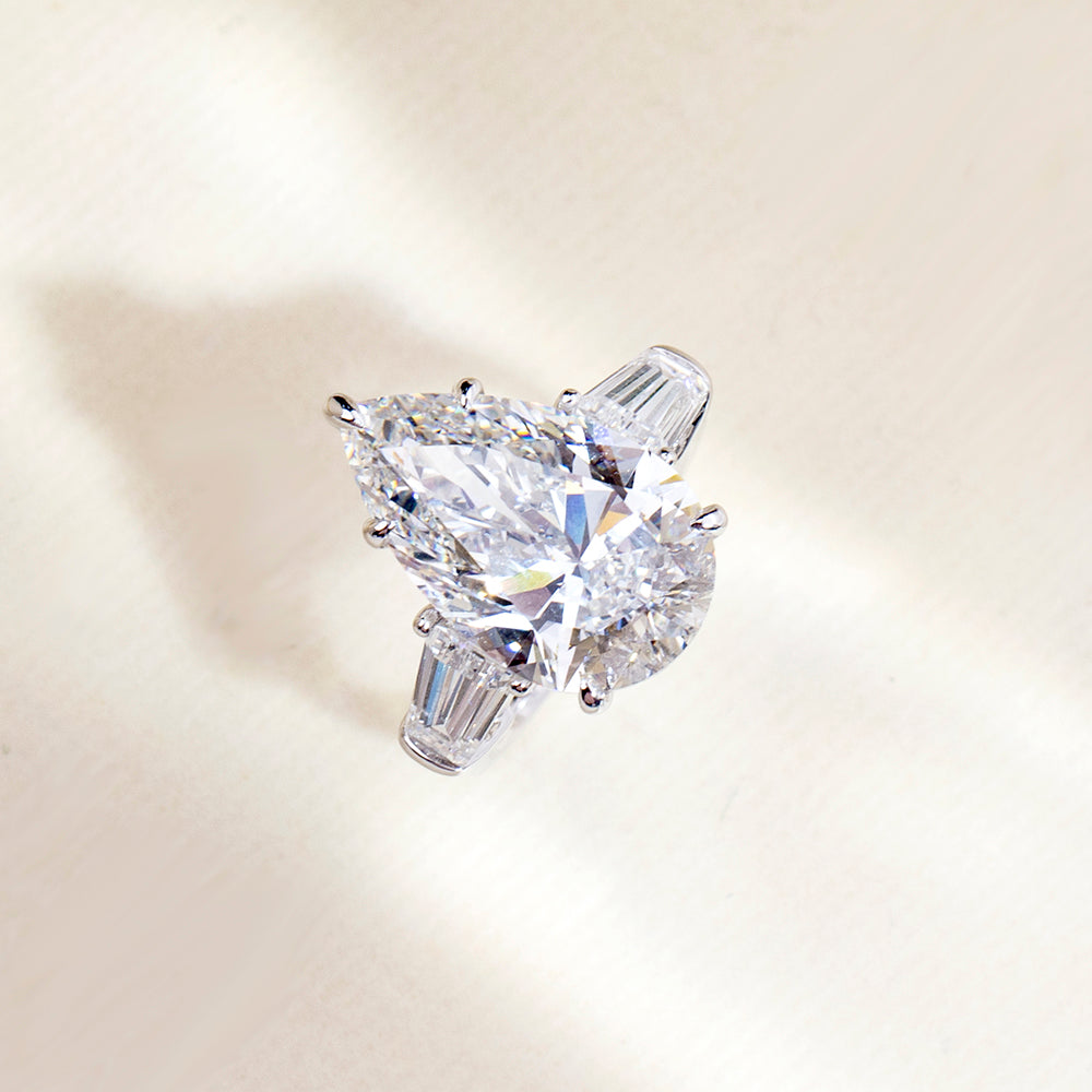 Eco-1888: Crowned Light – Lab-Grown Pear Diamond Three-Stone Ring in 18K White Gold