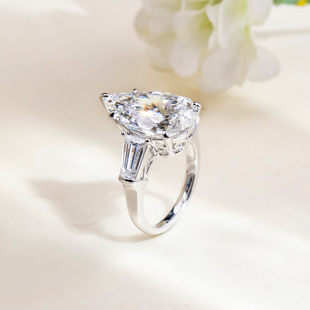Eco-1888: Crowned Light – Lab-Grown Pear Diamond Three-Stone Ring in 18K White Gold