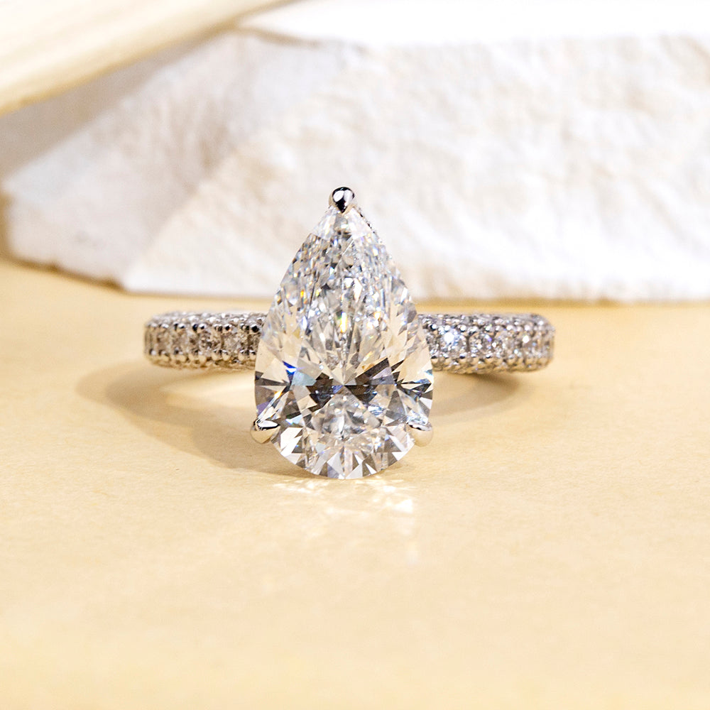 Eco-1897: Teardrop of Light – Lab-Grown Pear Diamond Pavé Ring in 18K White Gold