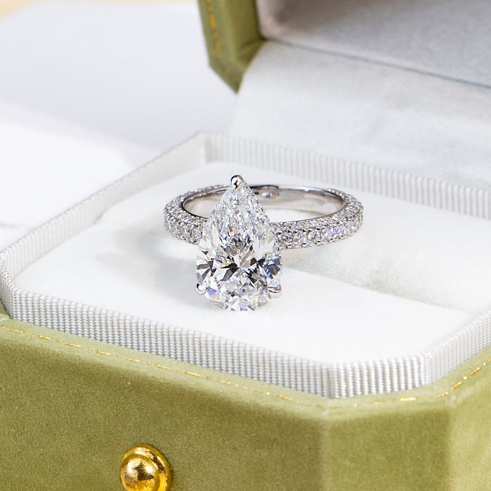 Eco-1897: Teardrop of Light – Lab-Grown Pear Diamond Pavé Ring in 18K White Gold