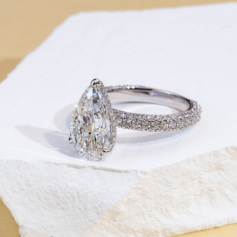 Eco-1897: Teardrop of Light – Lab-Grown Pear Diamond Pavé Ring in 18K White Gold