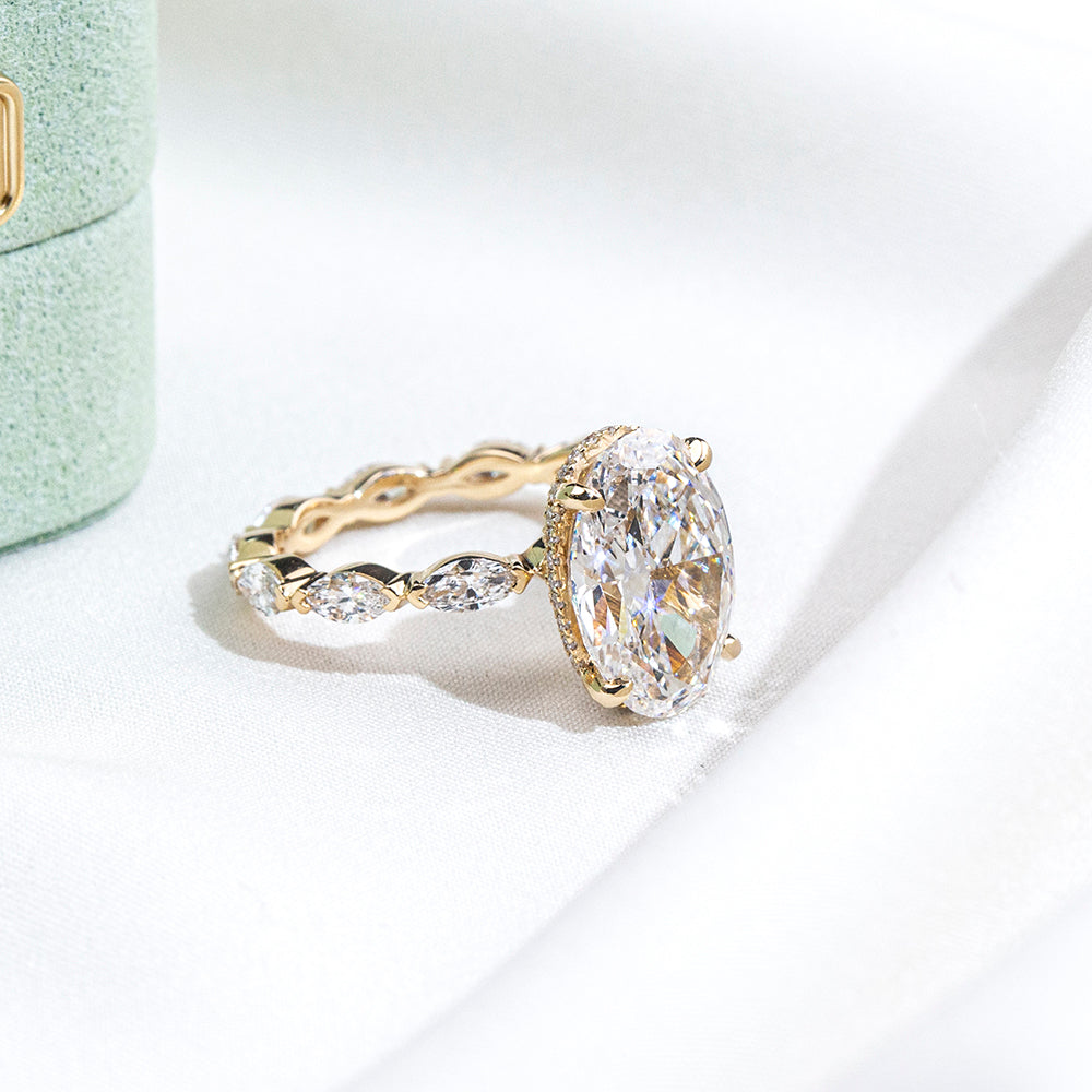 Eco-1904: Crowned Grace – Lab-Grown Oval Diamond Halo Ring with Marquise Band in 18K Yellow Gold