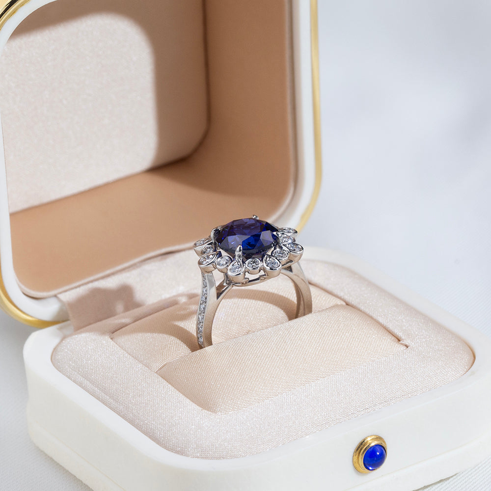 Eco-1905: Midnight Bloom – Lab-Grown Blue Sapphire & Diamond Halo Ring in 18K White Gold