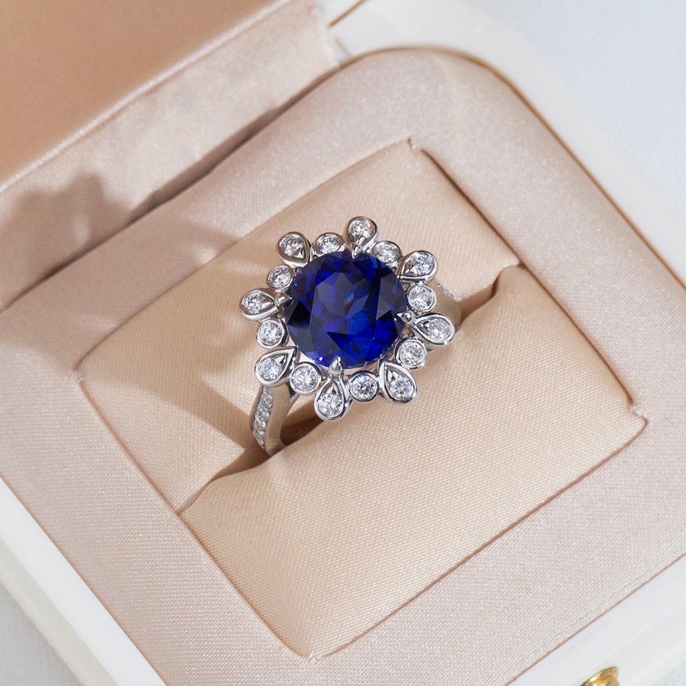 Eco-1905: Midnight Bloom – Lab-Grown Blue Sapphire & Diamond Halo Ring in 18K White Gold
