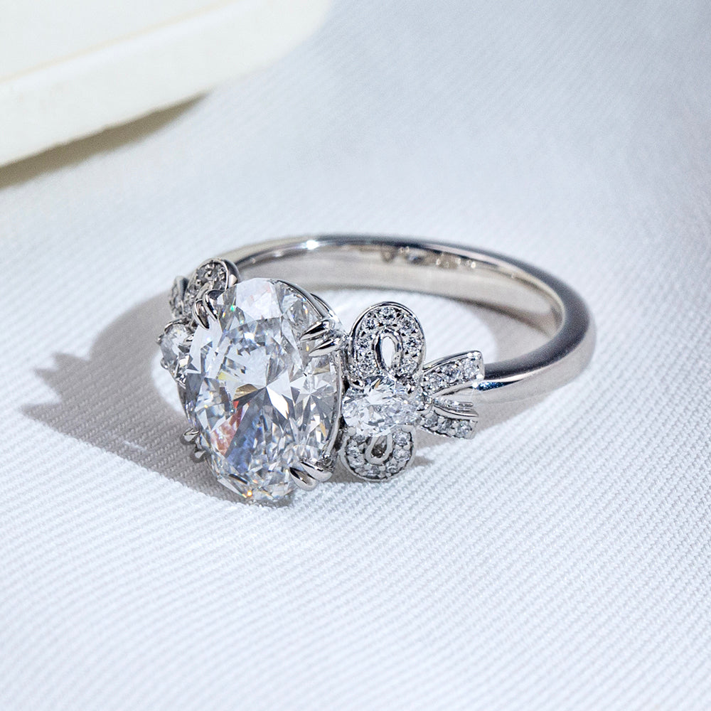 Eco-1906: Ribbon Radiance – Lab-Grown Oval Diamond Bow-Inspired Ring in 18K White Gold