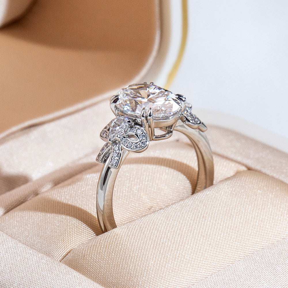 Eco-1906: Ribbon Radiance – Lab-Grown Oval Diamond Bow-Inspired Ring in 18K White Gold