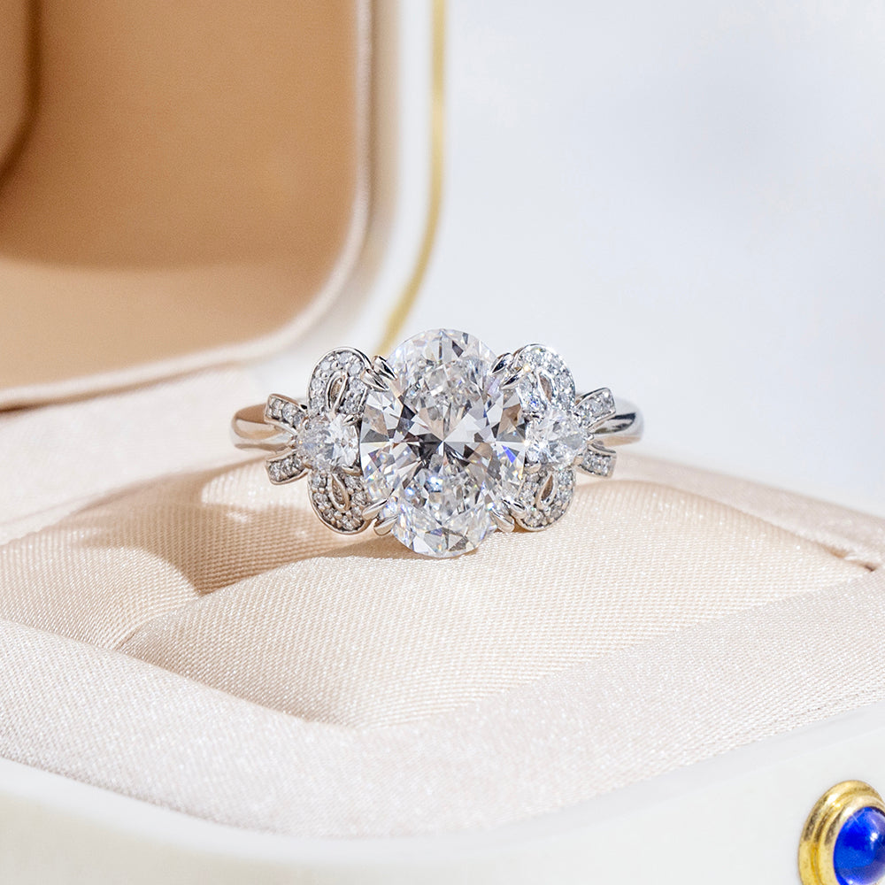 Eco-1906: Ribbon Radiance – Lab-Grown Oval Diamond Bow-Inspired Ring in 18K White Gold