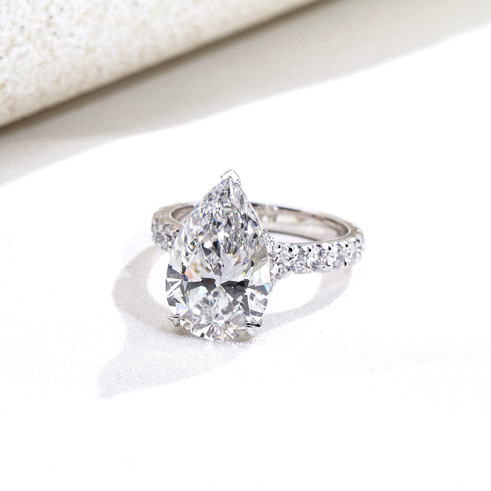 Eco-1915: Teardrop of Light – Lab-Grown Pear Diamond Pavé Ring in 18K White Gold