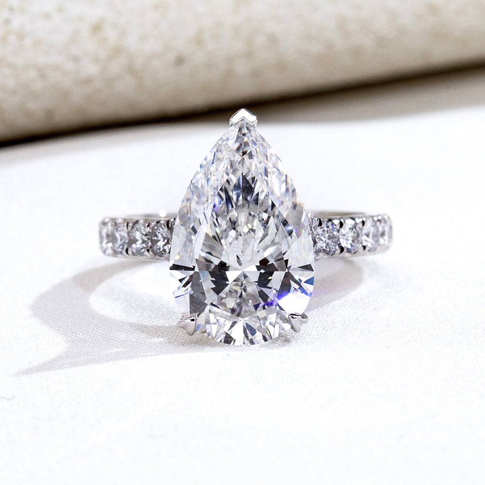 Eco-1915: Teardrop of Light – Lab-Grown Pear Diamond Pavé Ring in 18K White Gold