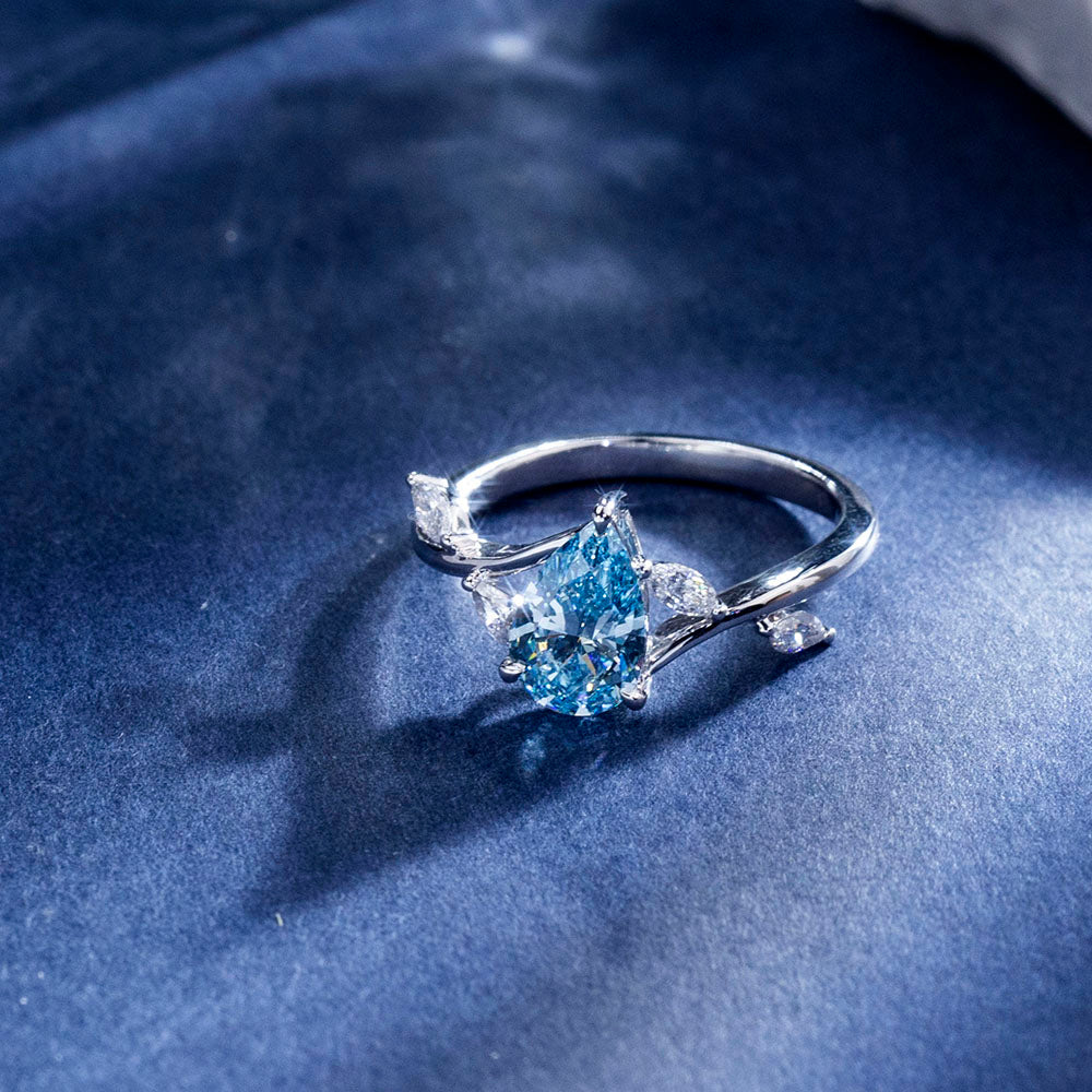 Eco-1860: Skyborn Grace – Lab-Grown Blue Diamond Leaf Ring in 18K White Gold