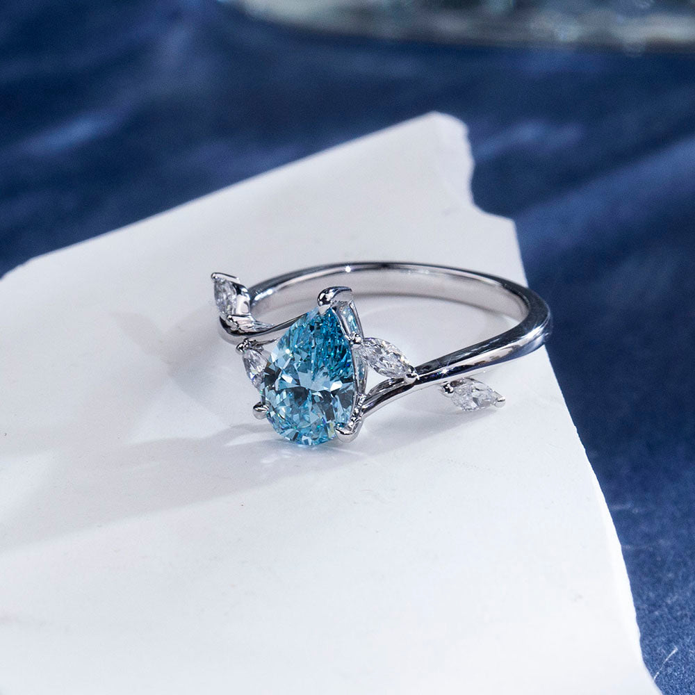 Eco-1860: Skyborn Grace – Lab-Grown Blue Diamond Leaf Ring in 18K White Gold