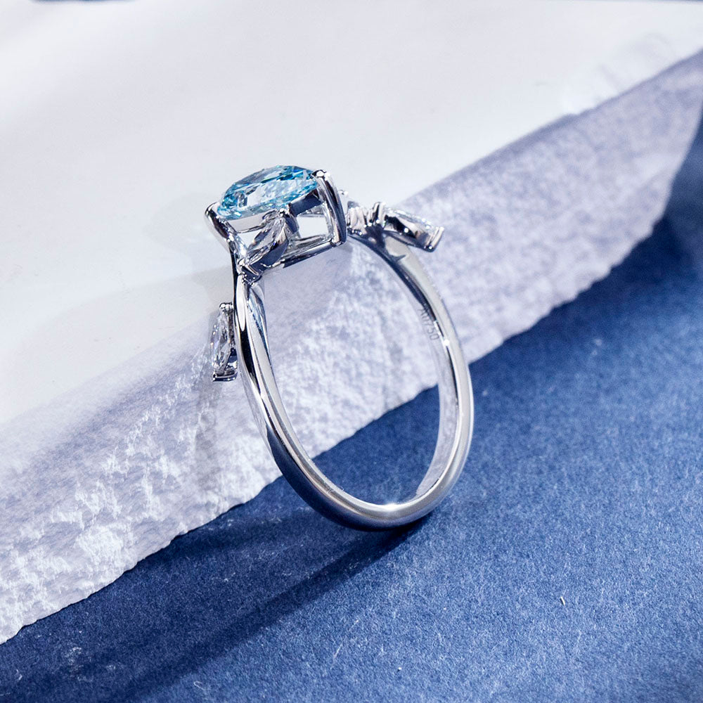 Eco-1860: Skyborn Grace – Lab-Grown Blue Diamond Leaf Ring in 18K White Gold