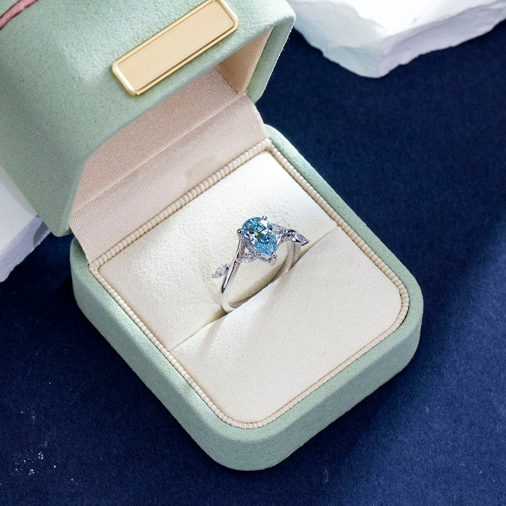 Eco-1860: Skyborn Grace – Lab-Grown Blue Diamond Leaf Ring in 18K White Gold