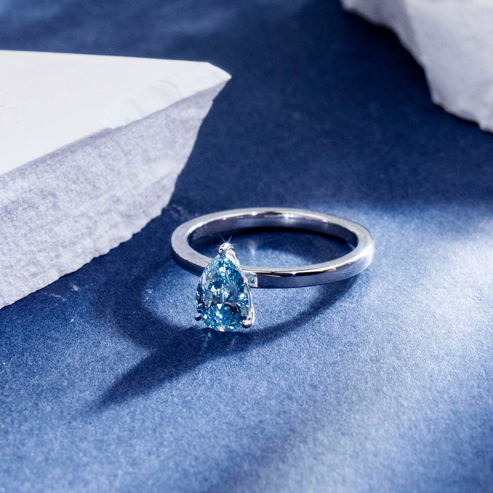Eco-1861: Ocean Ember – Lab-Grown Blue Diamond Solitaire Ring in 18K White Gold