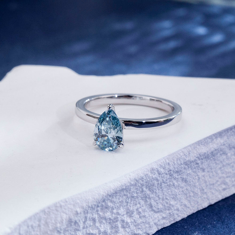 Eco-1861: Ocean Ember – Lab-Grown Blue Diamond Solitaire Ring in 18K White Gold