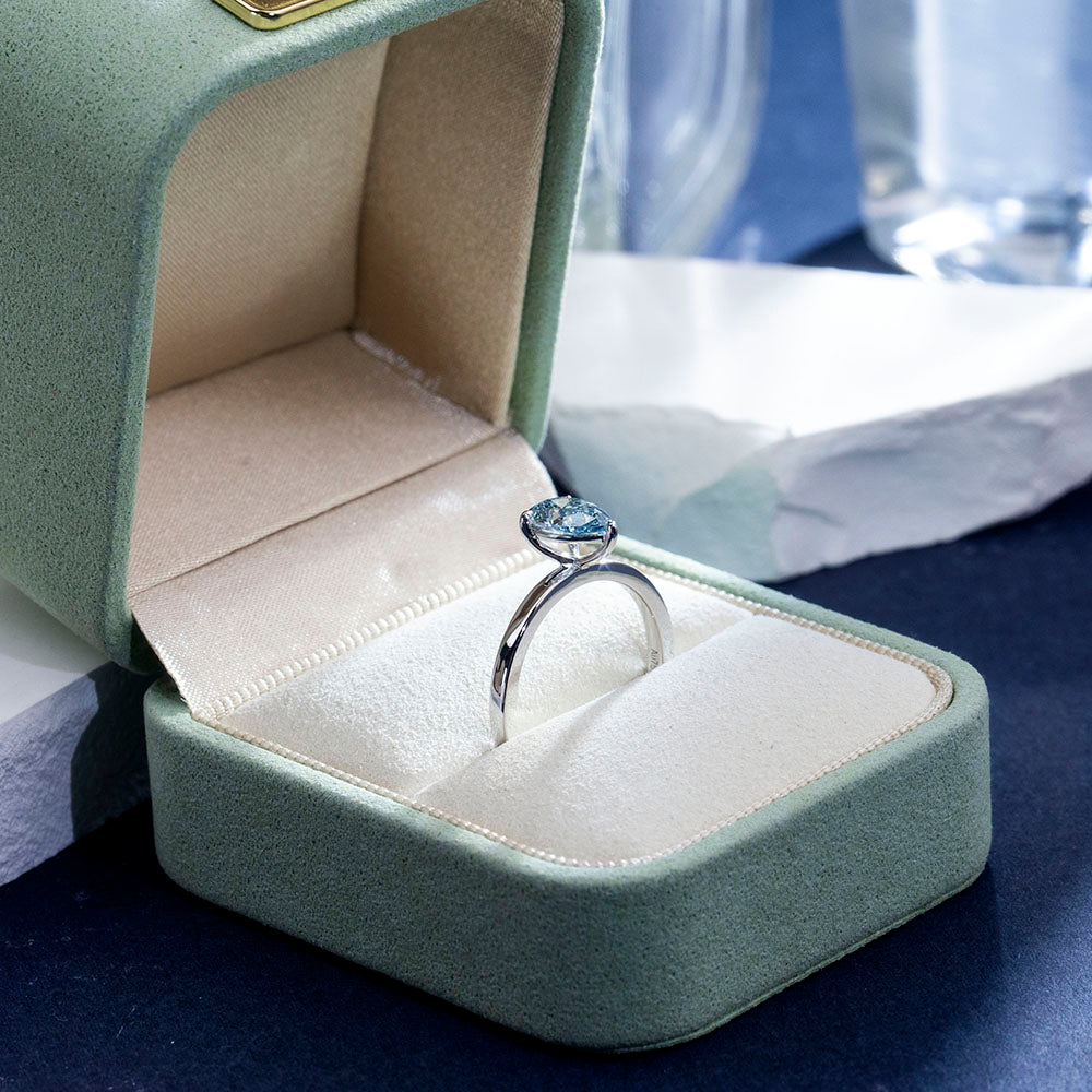 Eco-1861: Ocean Ember – Lab-Grown Blue Diamond Solitaire Ring in 18K White Gold