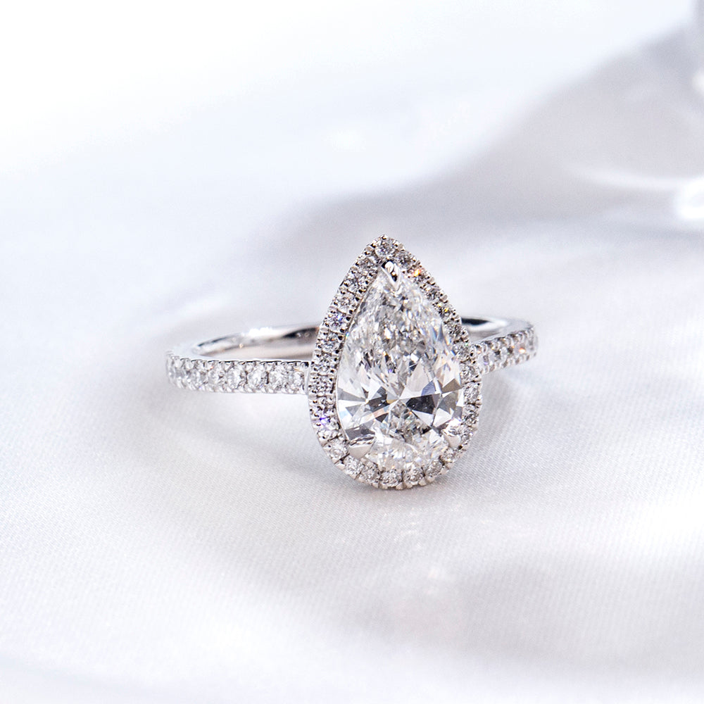 Eco-1884: Teardrop Radiance – Lab-Grown Pear Diamond Halo Ring in 18K White Gold
