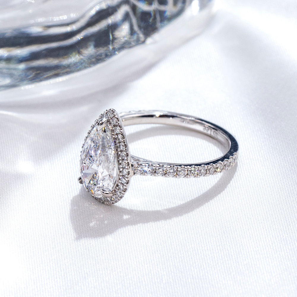 Eco-1884: Teardrop Radiance – Lab-Grown Pear Diamond Halo Ring in 18K White Gold