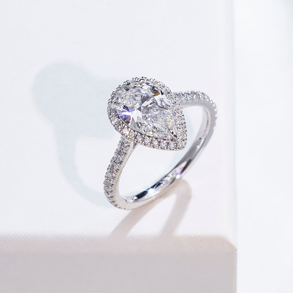 Eco-1884: Teardrop Radiance – Lab-Grown Pear Diamond Halo Ring in 18K White Gold
