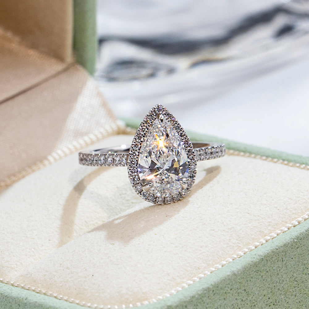Eco-1884: Teardrop Radiance – Lab-Grown Pear Diamond Halo Ring in 18K White Gold