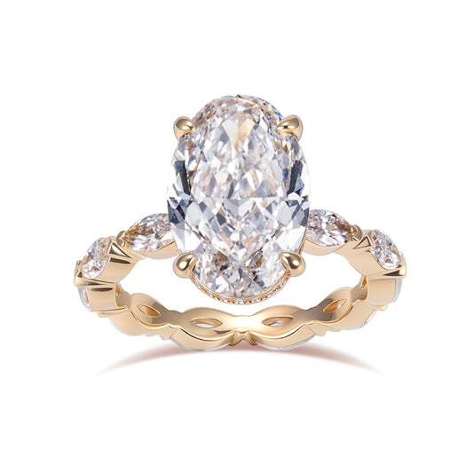 Eco-1904: Crowned Grace – Lab-Grown Oval Diamond Halo Ring with Marquise Band in 18K Yellow Gold
