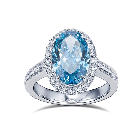 Eco-1817: Anillo de zafiro azul y diamantes cultivados en laboratorio en oro blanco de 18 quilates. 