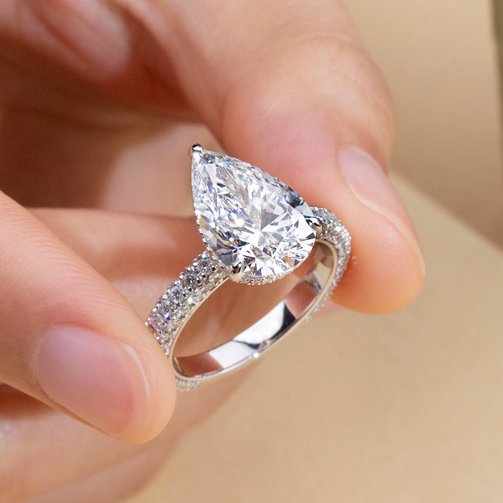Eco-1897: Teardrop of Light – Lab-Grown Pear Diamond Pavé Ring in 18K White Gold