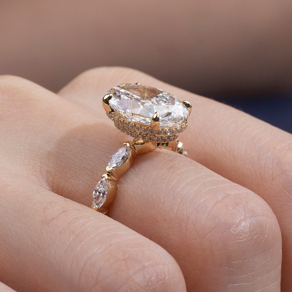 Eco-1904: Crowned Grace – Lab-Grown Oval Diamond Halo Ring with Marquise Band in 18K Yellow Gold