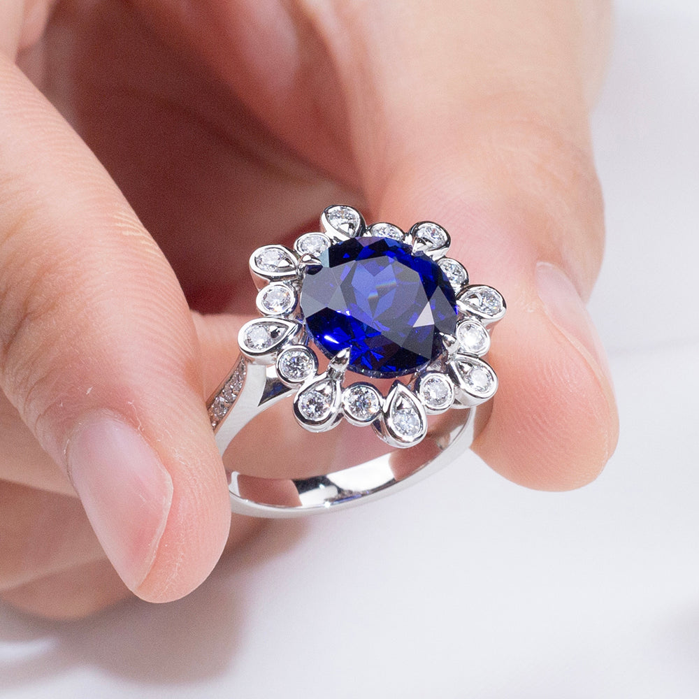Eco-1905: Midnight Bloom – Lab-Grown Blue Sapphire & Diamond Halo Ring in 18K White Gold