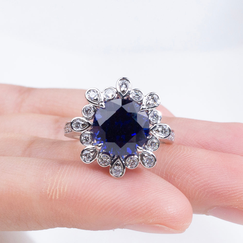 Eco-1905: Midnight Bloom – Lab-Grown Blue Sapphire & Diamond Halo Ring in 18K White Gold