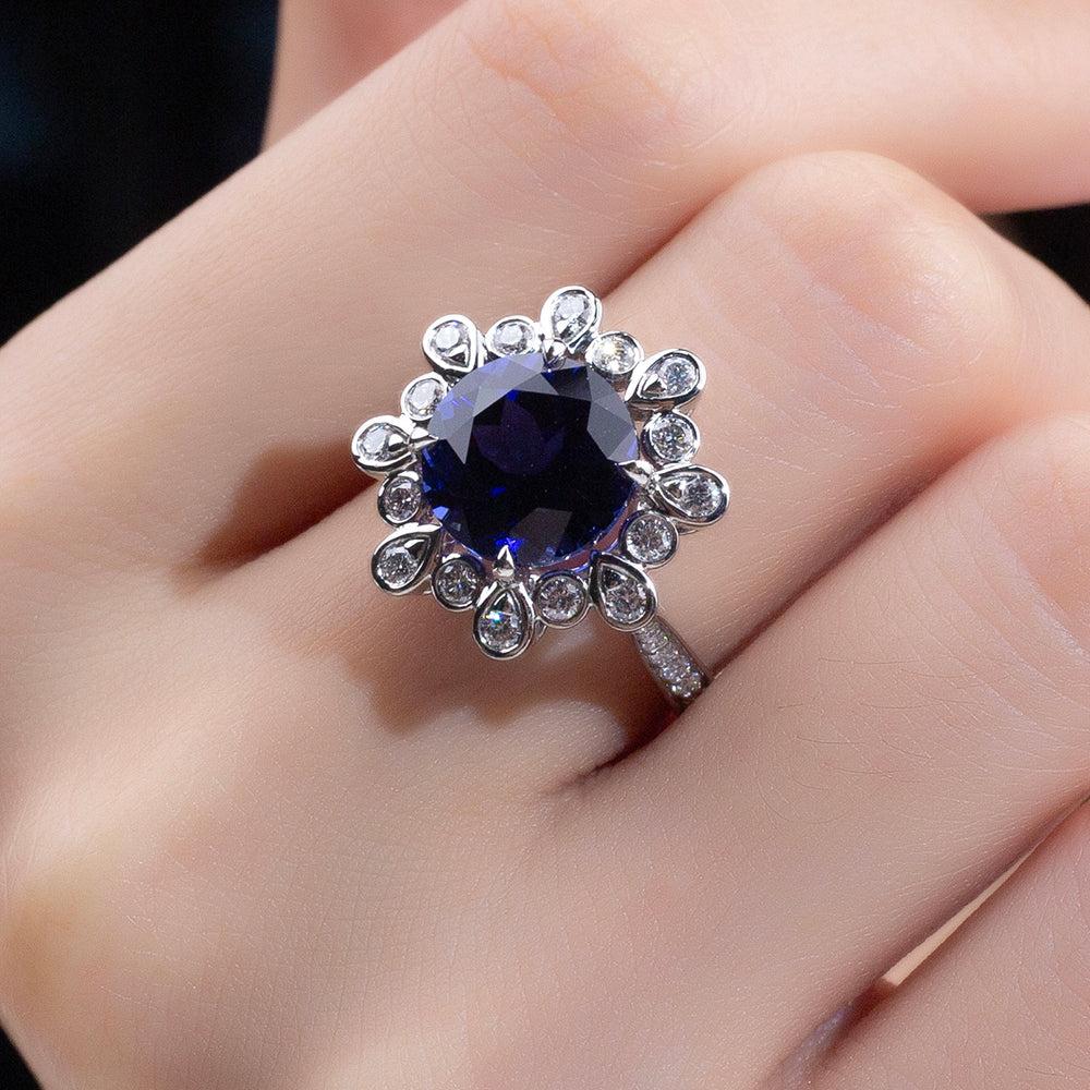 Eco-1905: Midnight Bloom – Lab-Grown Blue Sapphire & Diamond Halo Ring in 18K White Gold