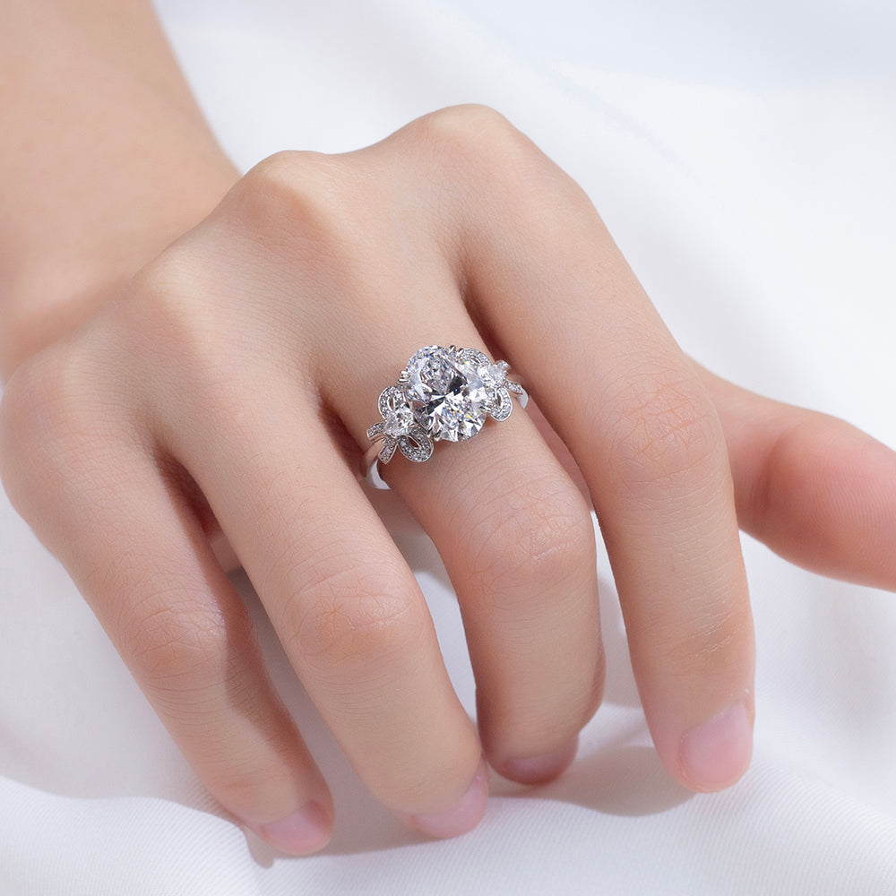 Eco-1906: Ribbon Radiance – Lab-Grown Oval Diamond Bow-Inspired Ring in 18K White Gold