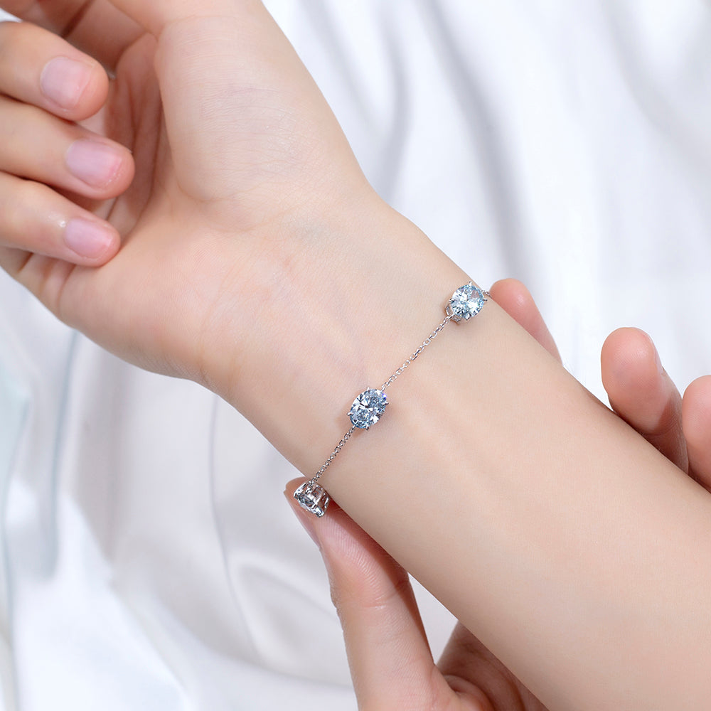 Ecob-637: Susurro de Luz – Pulsera de diamantes cultivados en laboratorio y zafiro azul en oro blanco de 18 quilates 