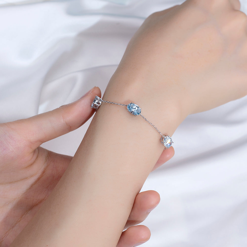 Ecob-637: Susurro de Luz – Pulsera de diamantes cultivados en laboratorio y zafiro azul en oro blanco de 18 quilates 