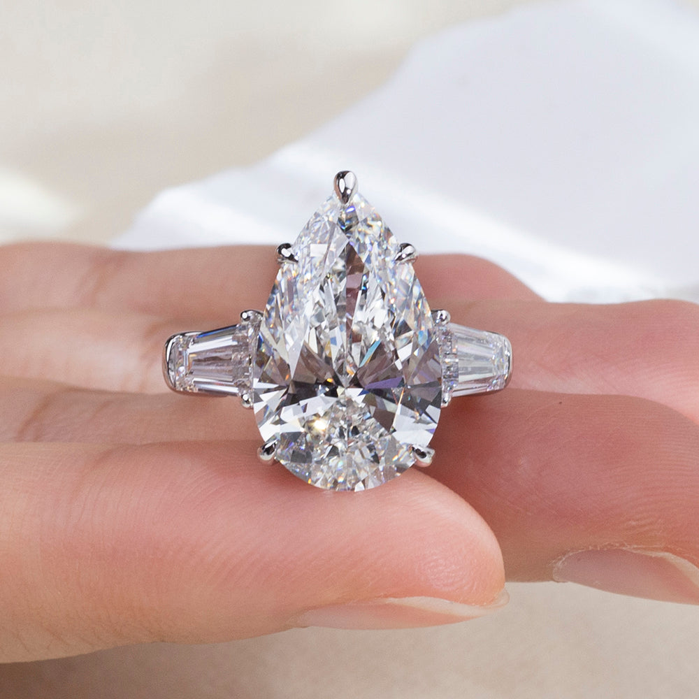 Eco-1888: Crowned Light – Lab-Grown Pear Diamond Three-Stone Ring in 18K White Gold