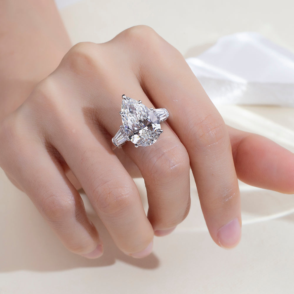 Eco-1888: Crowned Light – Lab-Grown Pear Diamond Three-Stone Ring in 18K White Gold