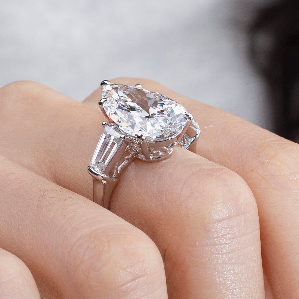 Eco-1888: Crowned Light – Lab-Grown Pear Diamond Three-Stone Ring in 18K White Gold