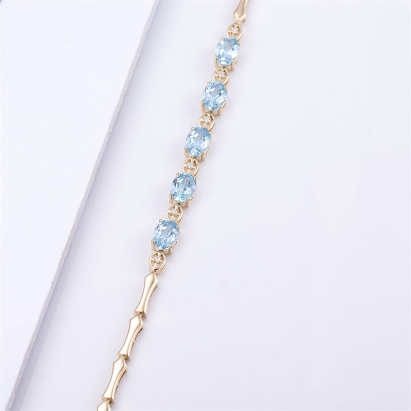 Ecob-594 | AzureGrace Oval Lab Sapphire Bracelet in 18K  Gold